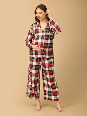 Playful pose by a Pregnant model wearing Check Me In Maternity and Nursing Pajama Set from the mom store