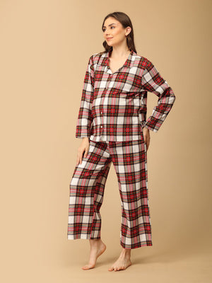 Pregnant model wearing Check Me In Maternity and Nursing Pajama Set from the mom store