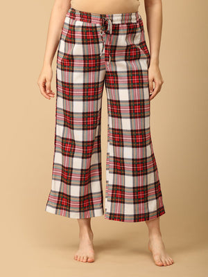 Trousers of a Pregnant model wearing Check Me In Maternity and Nursing Pajama Set from the mom store facing to the front