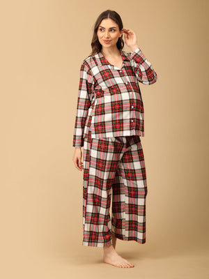 Playful pose by a Pregnant model wearing Check Me In Maternity and Nursing Pajama Set from the mom store