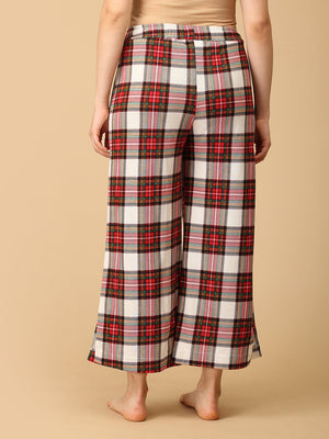 Trousers of a Pregnant model wearing Check Me In Maternity and Nursing Pajama Set from the mom store facing backwards