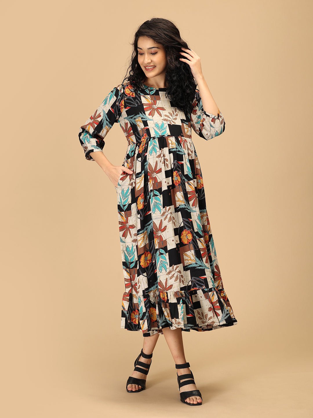 Front view of The Mom Store Chic Collage nursing dress with vibrant patchwork floral design.