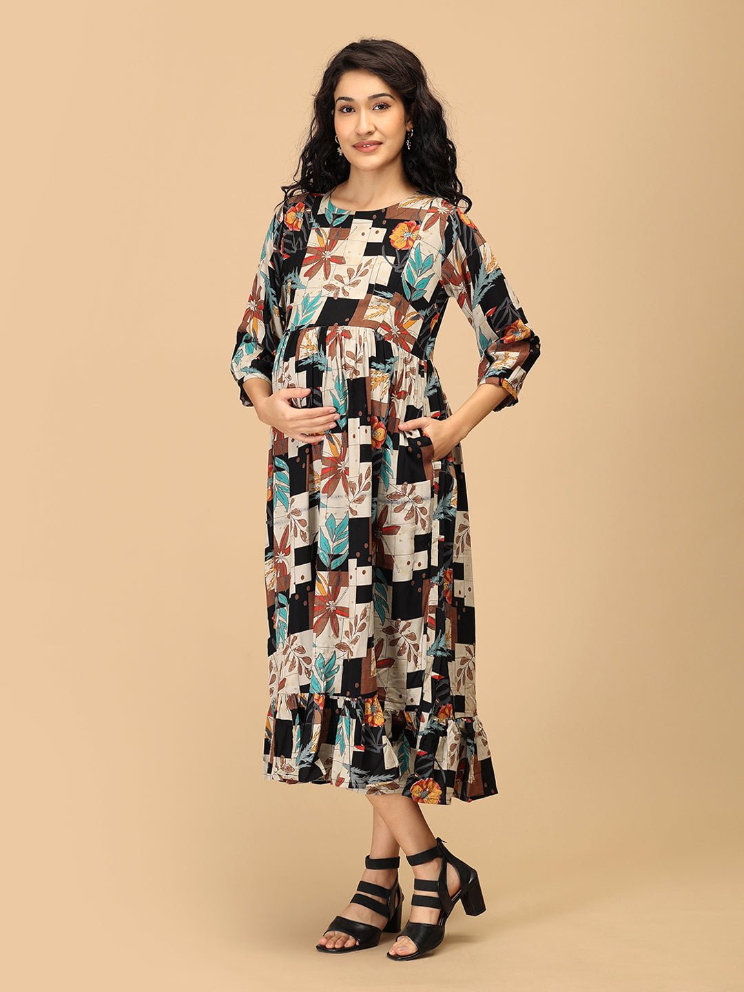 The Mom Store Chic Collage maternity and nursing dress flowing silhouette with patchwork floral print.
