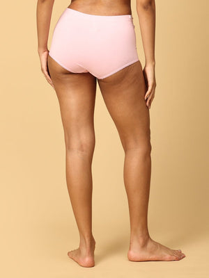 backside posed model wearing pink over belly support maternity panties from the mom store