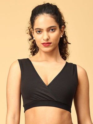 Model wearing black maternity nursing sleep bra from the Mom Store