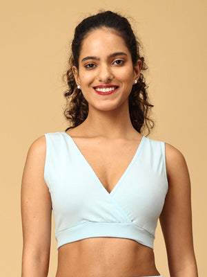 model wearing blue maternity nursing sleep bra from the Mom Store