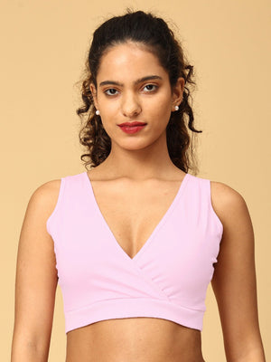 Models wearing pink maternity nursing sleep bra from the Mom Store