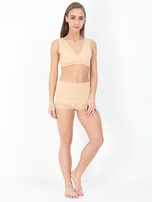 Playful pose by Model wearing Beige Maternity Over belly High Waist Lace Panty and Maternity Nursing Sleep Bra from the mom store facing us