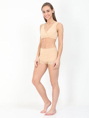 Playful pose by Model wearing Beige Maternity Over belly High Waist Lace Panty and Maternity Nursing Sleep Bra from the mom store