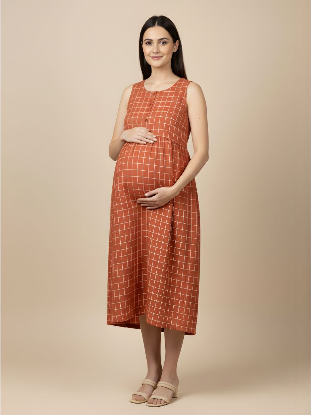Front view of Copper Daybreak Maternity and Nursing Shacket Dress showing sleeveless rust check maternity dress with button placket