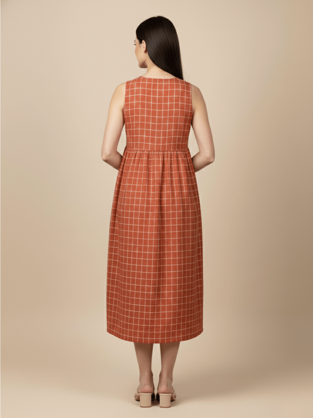 Back view of Copper Daybreak Maternity and Nursing Shacket Dress featuring rust check maternity dress