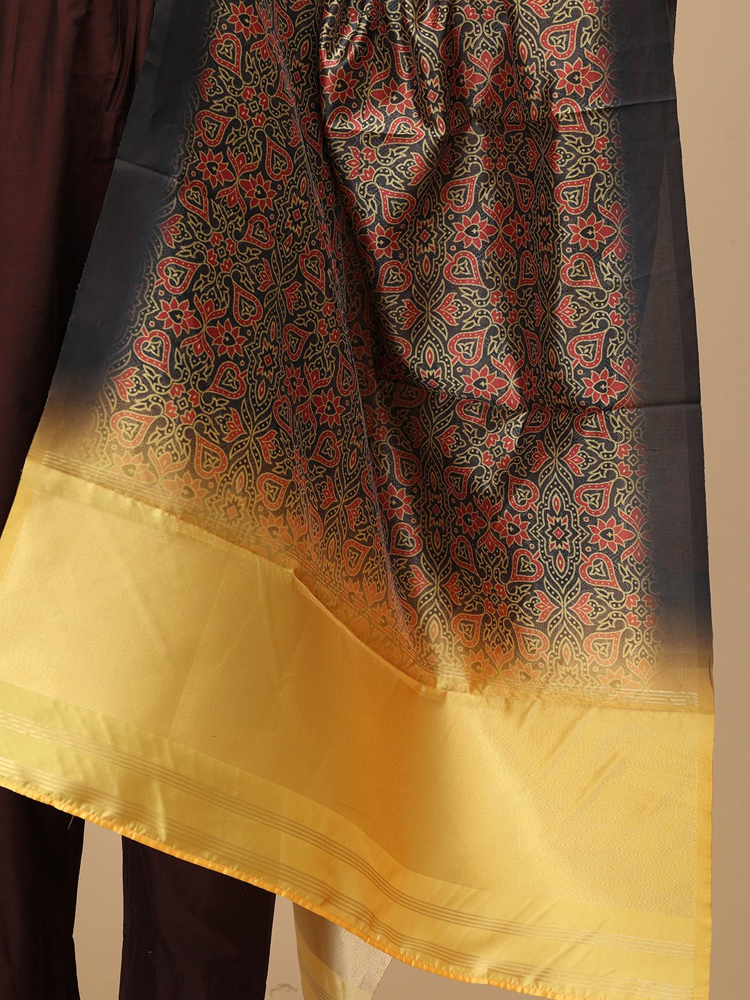 Close-up of The Mom Store printed dupatta with black, red, and gold motifs from the Cozy Café kurta set.