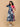 Smiling woman wearing The Mom Store Dual Bloom maternity and nursing wrap dress with bold florals.