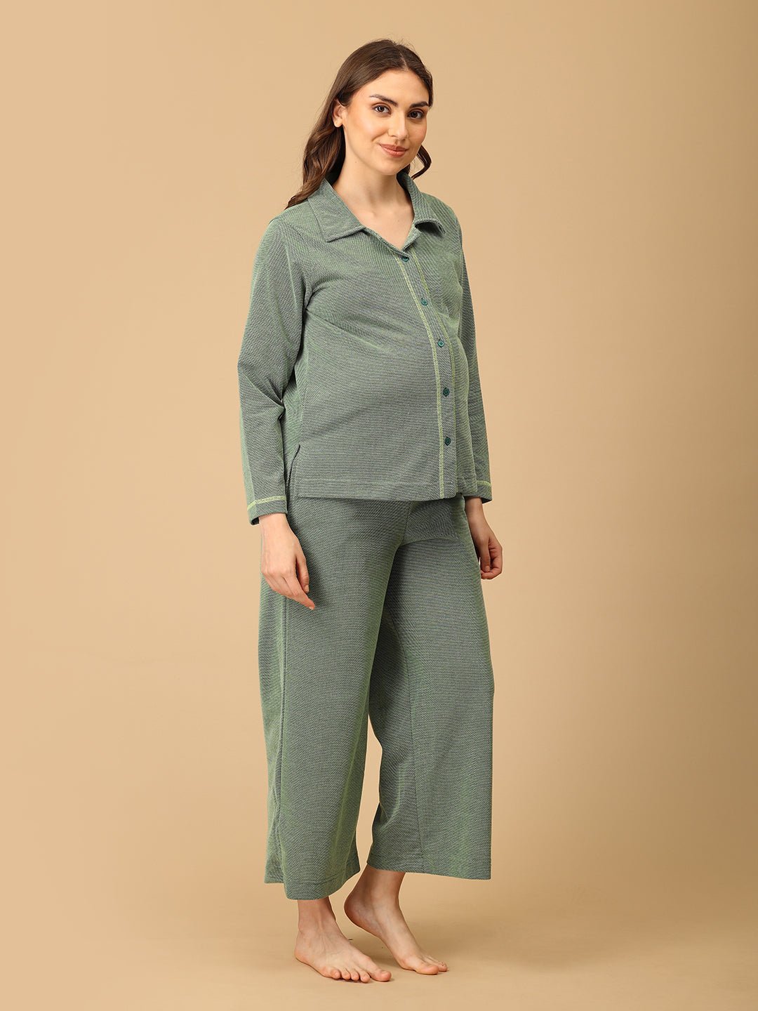 The Mom Store maternity pajama set in Evergreen Ease green, full-length view with relaxed-fit pants.
