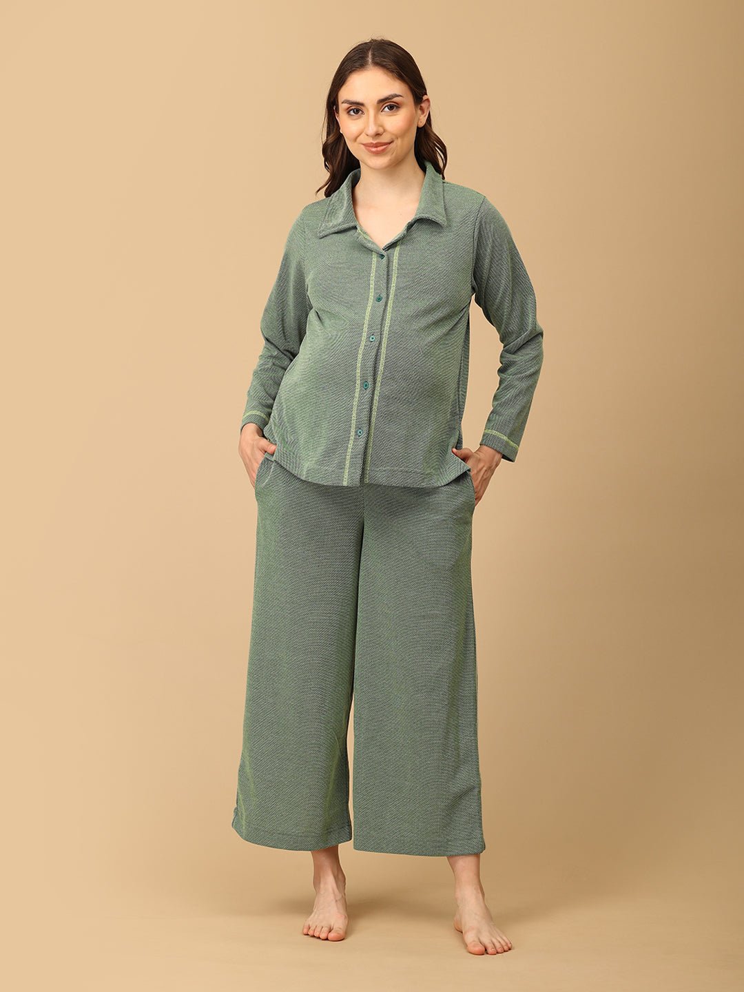 The Mom Store cozy green Evergreen Ease maternity sleepwear set with collared top and wide-leg bottoms.