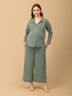 The Mom Store cozy green Evergreen Ease maternity sleepwear set with collared top and wide-leg bottoms.