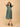 Twirling pose in The Mom Store green striped Everyday Ease maternity and nursing dress.