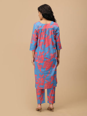 Back view of blue maternity and nursing kurta with coral floral print and three-quarter sleeves.