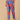 Side view of blue floral maternity pants highlighting breathable fabric and ankle-length cut.