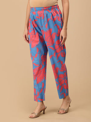 Side view of blue floral maternity pants highlighting breathable fabric and ankle-length cut.