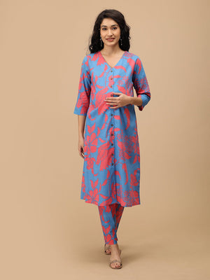 Model wearing a blue and coral printed maternity and nursing co-ord set with button-front kurta and matching pants.