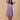 Model wearing blue and coral maternity and nursing co-ord set styled for pregnancy and postpartum wear.