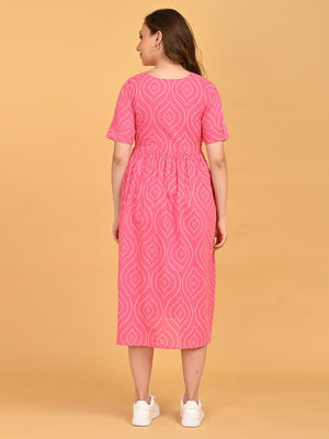 Back view of Flamingo Flirt Maternity and Nursing Dress with short sleeves and all-over geometric print.
