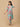 Model walking in a mint floral maternity and nursing kurta set, showcasing flowy fabric and easy movement.
