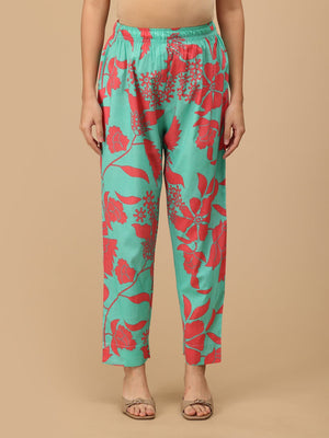 Front view of mint green floral maternity pants with soft elasticated waistband for comfort.