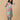 Front view of model in mint green floral maternity kurta set, showing comfortable silhouette and three-quarter sleeves.