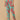 Side view of mint green floral maternity pants with soft elasticated waistband for comfort.