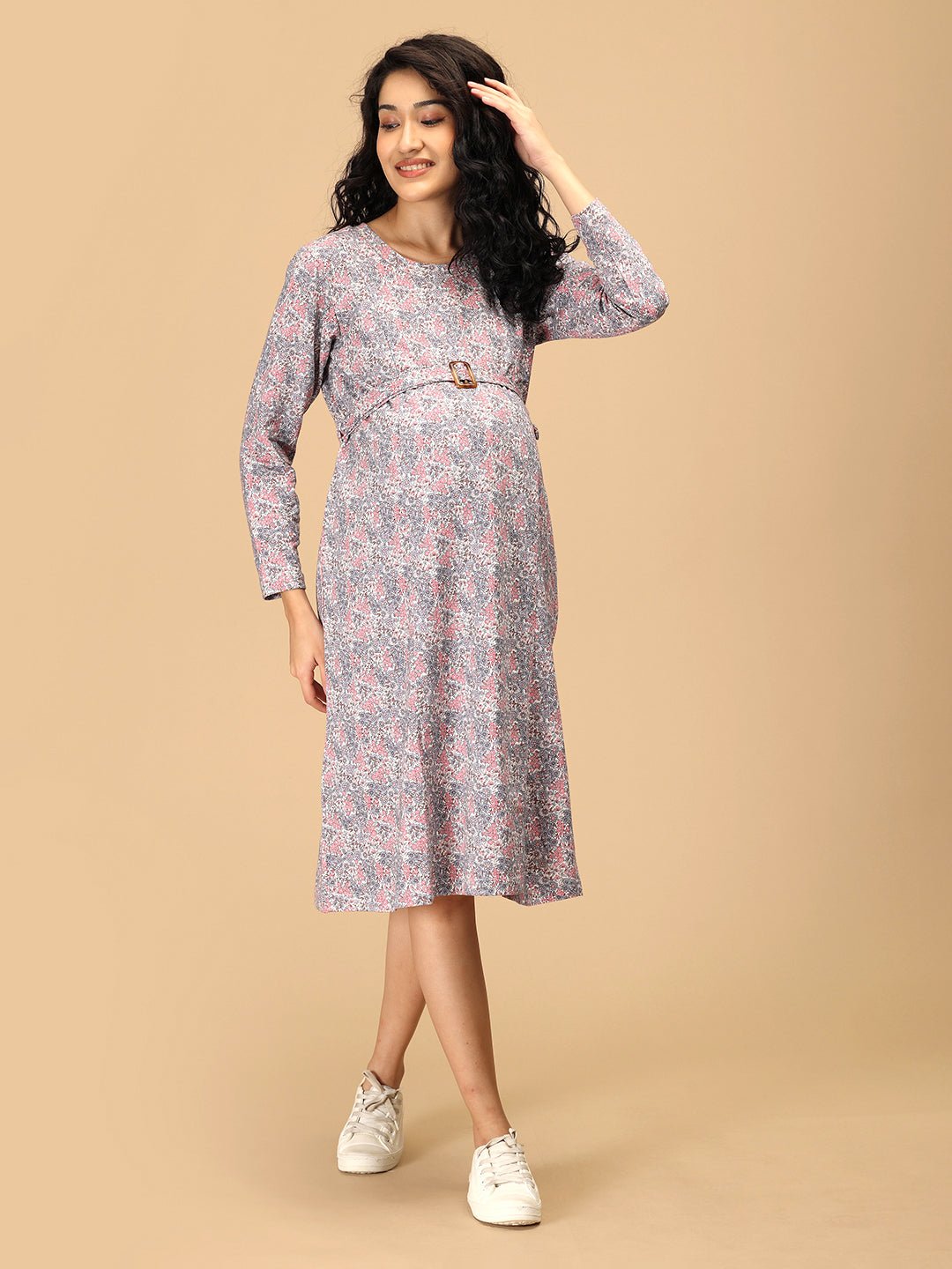 Side pose showcasing Frosted Flowers Nursing Sweater Dress with comfortable stretch and floral pattern