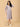 Side pose showcasing Frosted Flowers Nursing Sweater Dress with comfortable stretch and floral pattern