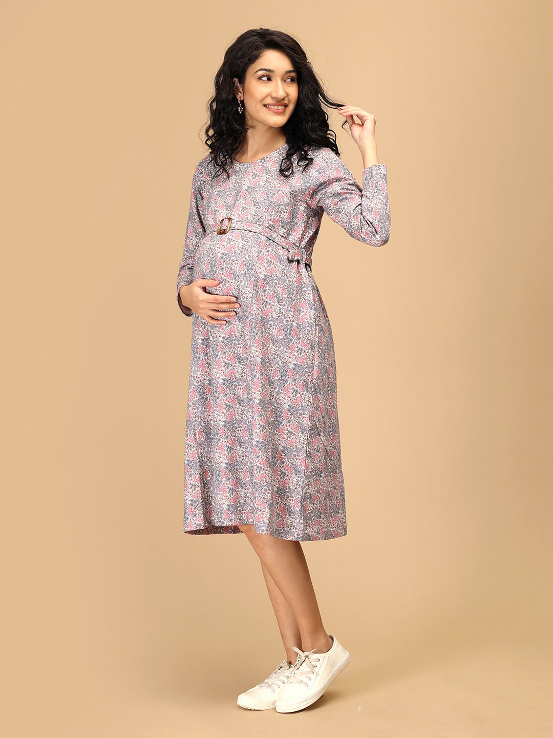 Maternity floral sweater dress with adjustable waist belt and full sleeves for pregnancy comfort