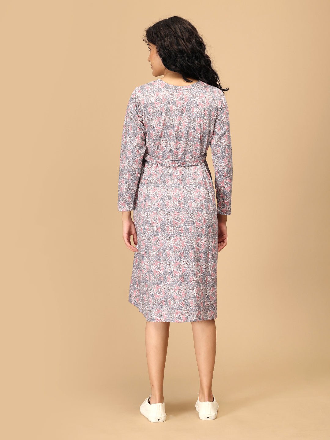 Back view of Frosted Flowers Maternity Sweater Dress with long sleeves in soft floral knit fabric