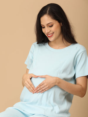 The Mom Store Frosted Fluff maternity nightwear with mom-to-be making heart gesture, cozy and stylish sleepwear