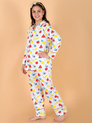 Model wearing Fruity Cutie Women's Pajama Set from the mom store with a hand on her waist turned sideways