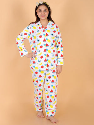 Model wearing Fruity Cutie Women's Pajama Set from the mom store with a hand on her waist