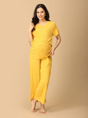 Pregnant Model wearing Golden Glow-Up Maternity and Nursing Nightwear Set from the mom store