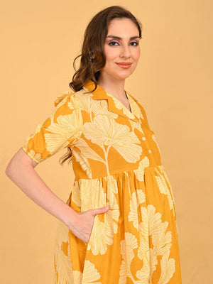 Angled full-length shot of Golden Lily Maternity And Nursing Dress with tiered hem
