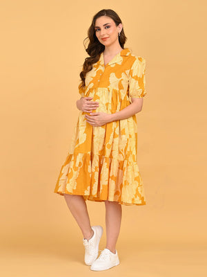 Front pose of Golden Lily Maternity And Nursing Dress with hands on baby bump