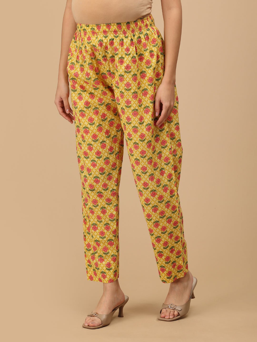 Comfort-fit floral maternity pants in yellow from The Mom Store, side view
