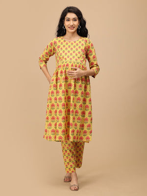 Yellow floral maternity kurta set with pockets by The Mom Store, comfortable nursing style