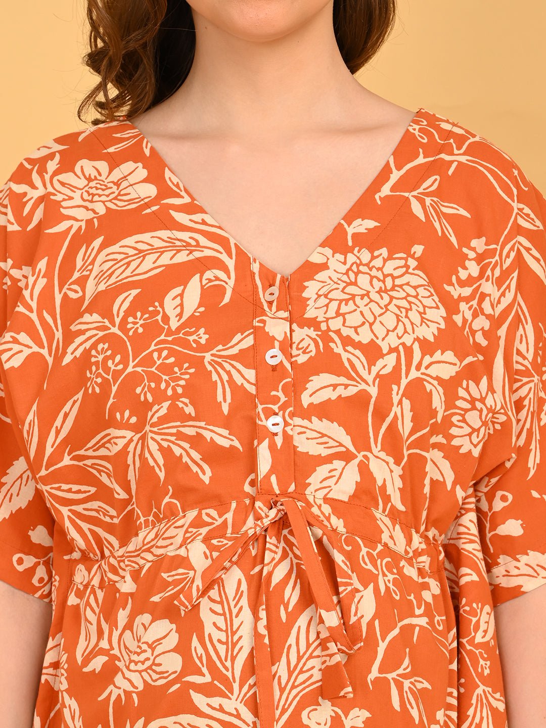 Happy Hues Maternity and Nursing Kaftan Nighty close-up of V-neckline with front button placket for easy nursing access. 