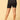 Back view of black coloured over the belly support panties from the mom store showing adjustible bands