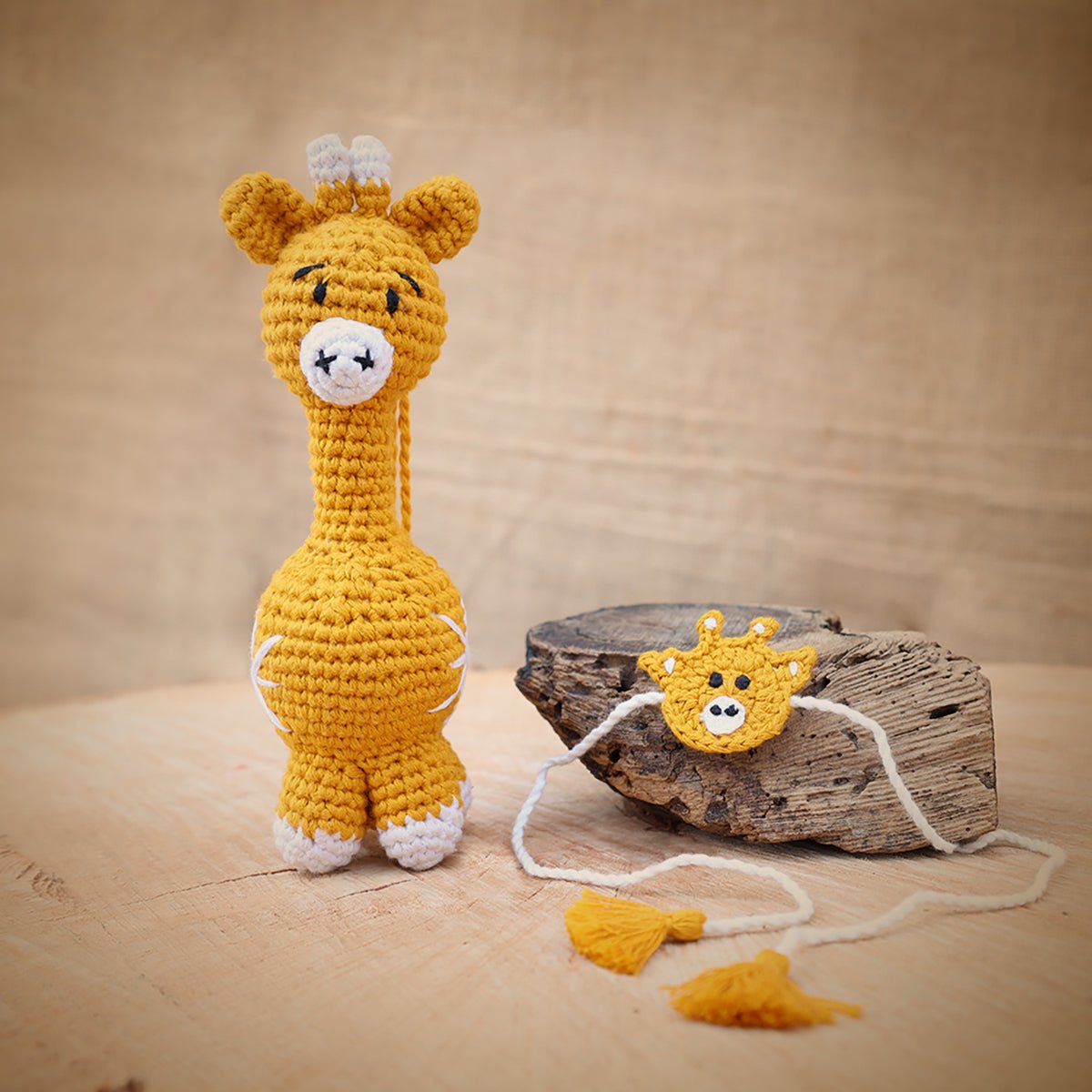 Himalayan Blooms Giraffe Plush Toys and Rakhi - Retrieving data. Wait a few seconds and try to cut or copy again.