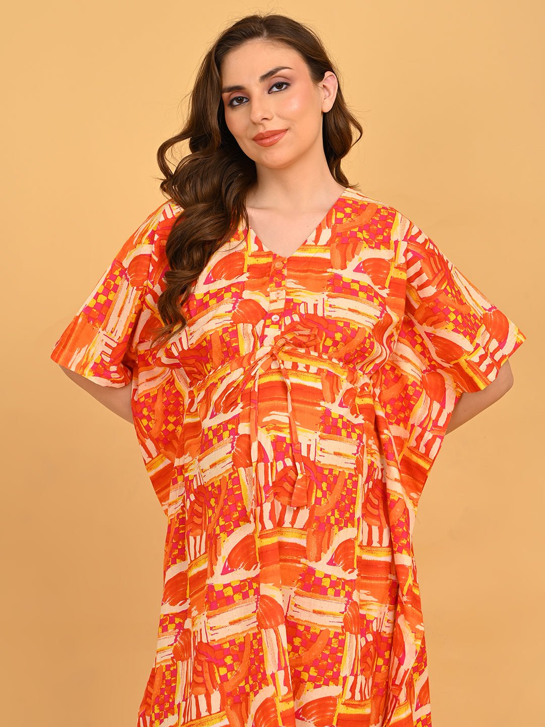 Hues & Honey Maternity and Nursing Kaftan Nighty relaxed portrait with model smiling and hands near head, showcasing wide sleeves.