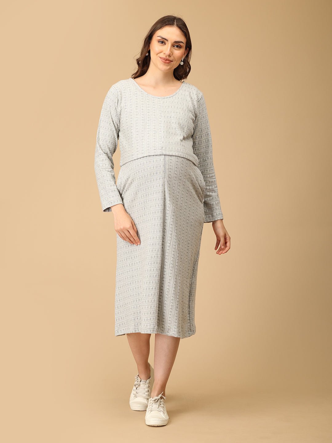 Elegant maternity and nursing dress with shrug in soft grey pattern, designed for pregnant and breastfeeding moms. Made from breathable fabric with hidden zipper for easy nursing access, side pockets, and detachable shrug. Perfect for maternity wear India, feeding dresses online, and everyday comfort with effortless style.