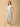 Elegant maternity and nursing dress with shrug in soft grey pattern, designed for pregnant and breastfeeding moms. Made from breathable fabric with hidden zipper for easy nursing access, side pockets, and detachable shrug. Perfect for maternity wear India, feeding dresses online, and everyday comfort with effortless style.