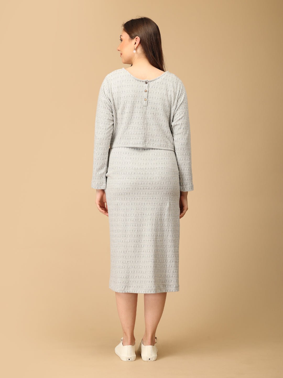 Elegant maternity and nursing dress with shrug in soft grey pattern, designed for pregnant and breastfeeding moms. Made from breathable fabric with hidden zipper for easy nursing access, side pockets, and detachable shrug. Perfect for maternity wear India, feeding dresses online, and everyday comfort with effortless style.